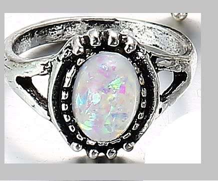 Gorgeous Tibetan silver framed sim opal ring