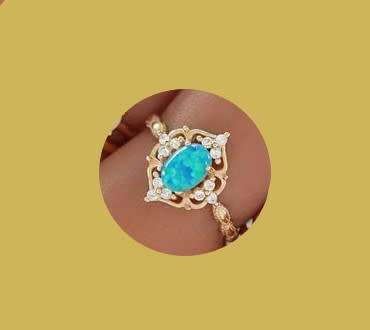 Stunning Aqua sim opal 9ct gold plated ring