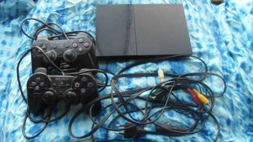 Sony Playstation 2, with 2 controllers