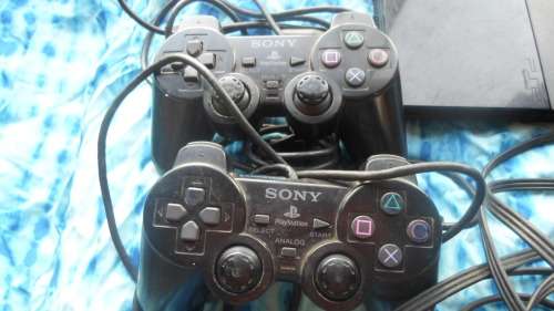 Sony Playstation 2, with 2 controllers