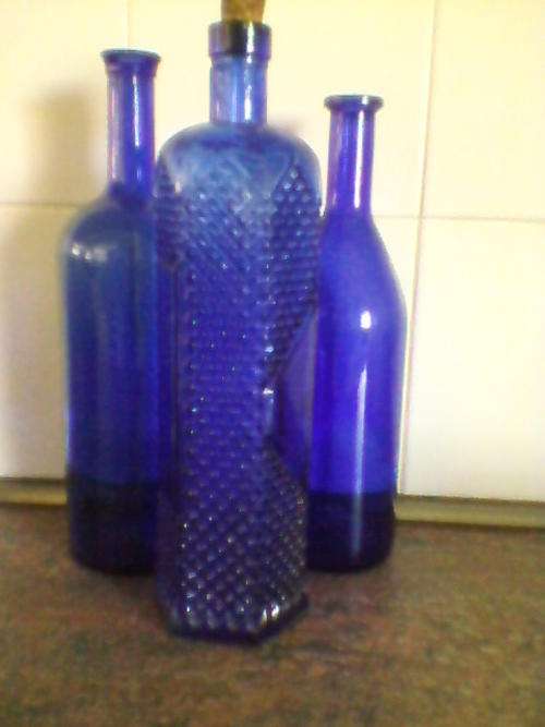 Collection of blue bottles plus a free gift