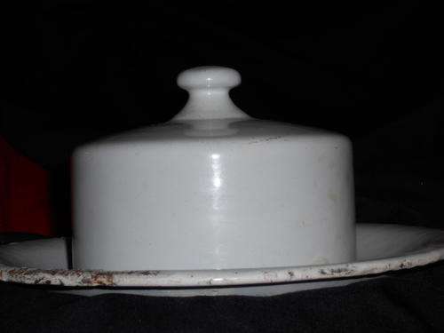 Enamel\cheese  holder. unreadable markings-very old 22cm dia 11cm high, enemal chipted off in places