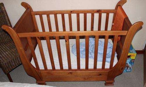 Beautiful Oregan stained sleigh cot with mattress