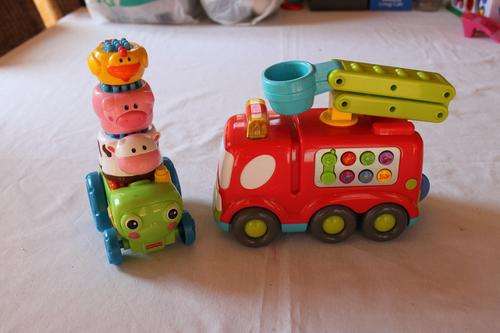 Fisher Price tractor and Woolworths Truck