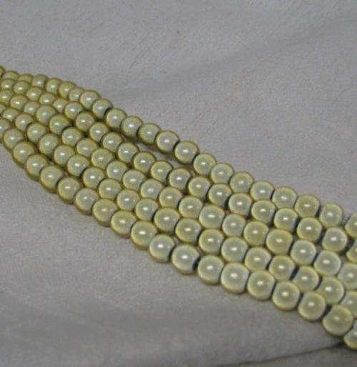 CRAZY BEAD SALE ASSORTED SIZES - frosted or splattered strings.