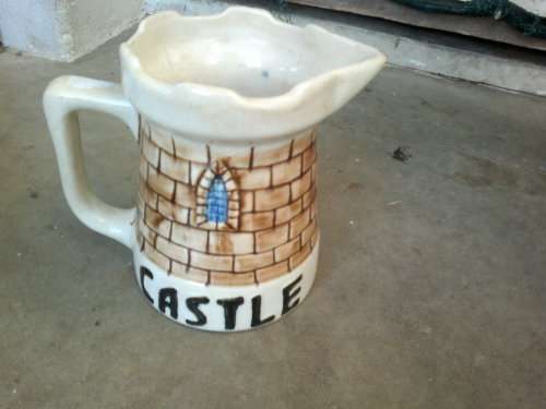 AN AWESOME COLLECTIBLE VINTAGE `CASTLE BEER` JUG BY DROSTDY WARE GRAHAMSTOWN POTTERS LTD