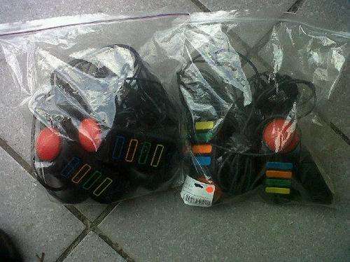 selling 2 bags of ps2 sony buz remotes buy per bag.4 remotes per bag