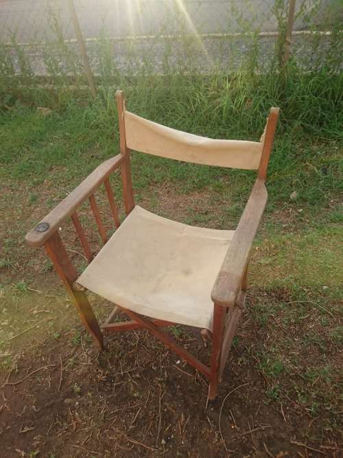 ANTIQUE FOLD UP CHAIR,THE BACK FABRIC NEED TLC. COURIER OPTION ONLY