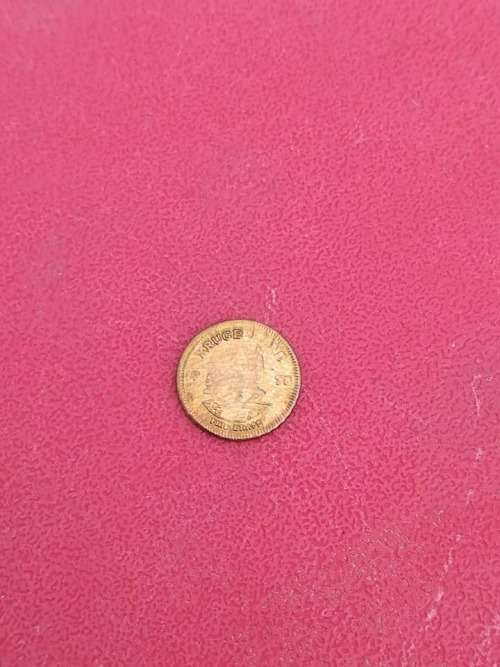 small brass token