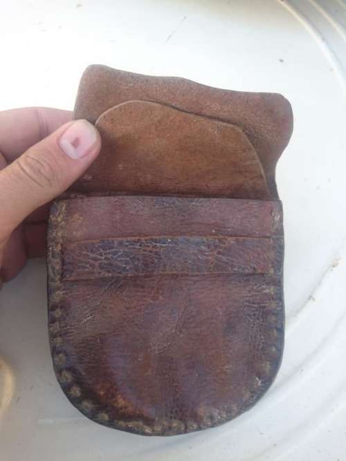 antique leather tabaco holder or money holder.it have two sections