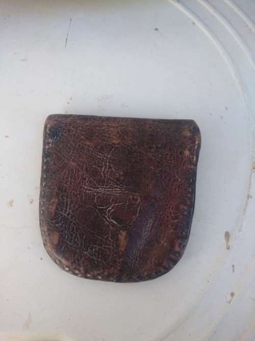 antique leather tabaco holder or money holder.it have two sections