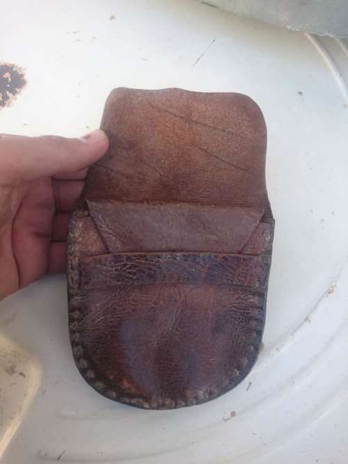 antique leather tabaco holder or money holder.it have two sections