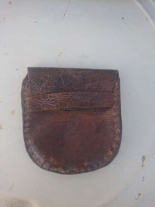 antique leather tabaco holder or money holder.it have two sections