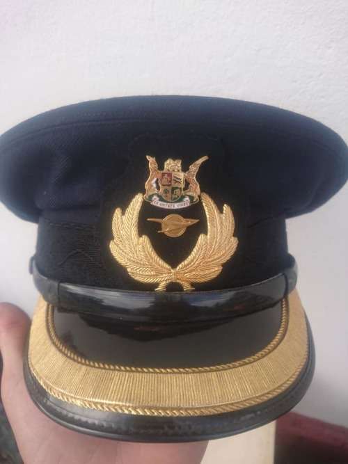 Scarce Vintage Black SAR Cap..HJ Henochsberg, Johannesburg...