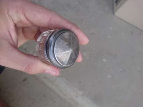 Klein antieke glas hourtjie met sterling silver prop