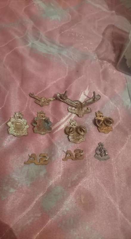 small collection of 9 Badges