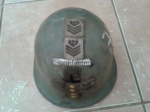 SADF/SANDF HELMET .STAFF SERGEANT AND OTHER INSIGNIA ATTACHED