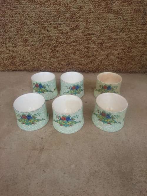 Antique porcelain egg holders