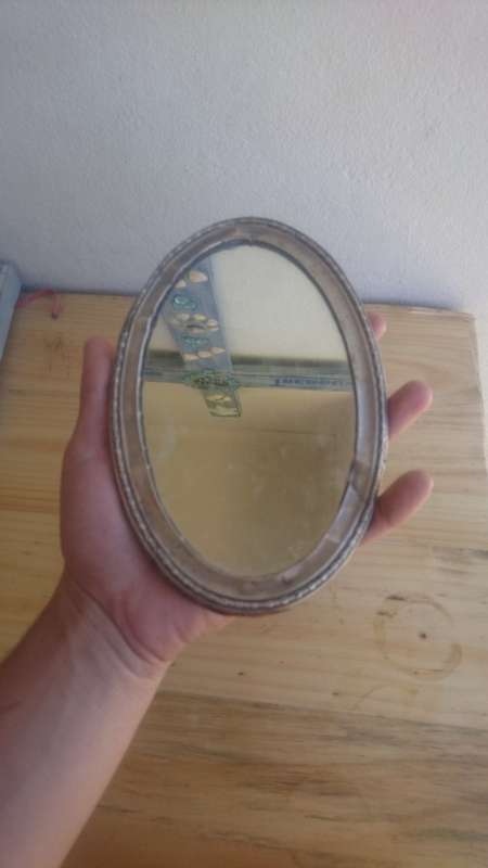 Small sterling silver mirror.do have some dents