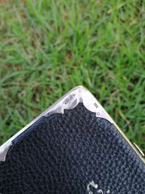 Silver and genuine Leather holder
