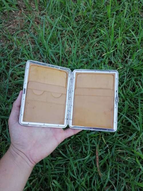 Silver and genuine Leather holder