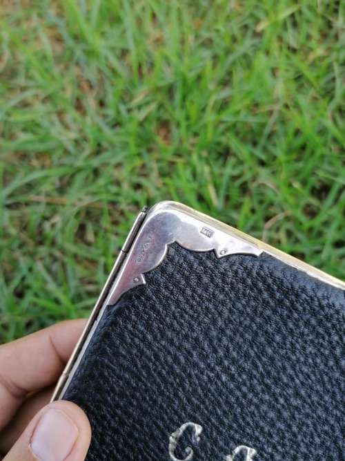 Silver and genuine Leather holder