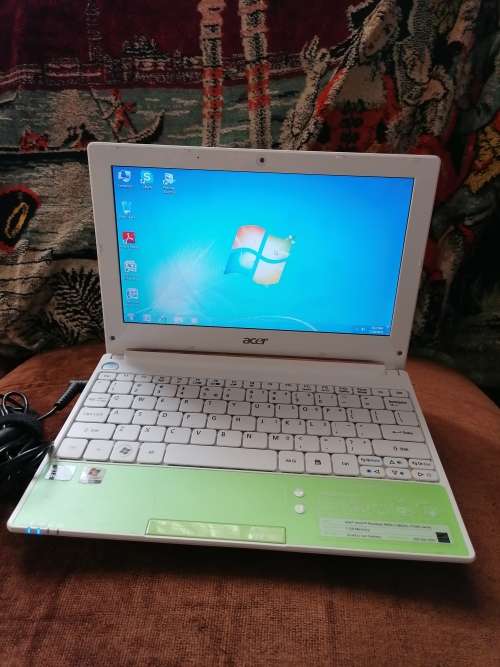 Acer Aspire laptop with charger and bag