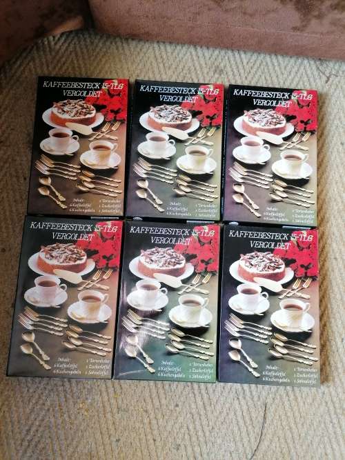New Old Stock Unused 15 piece gold plated cutlery set. Bid per box