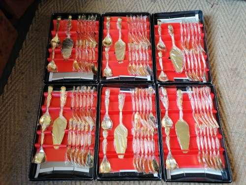 New Old Stock Unused 15 piece gold plated cutlery set. Bid per box