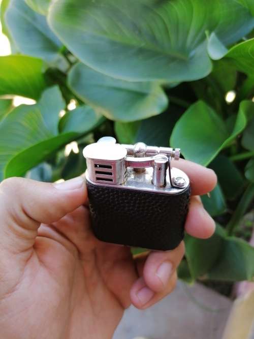 Vintage dunghill lighter