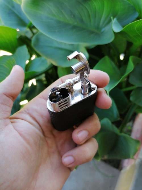 Vintage dunghill lighter