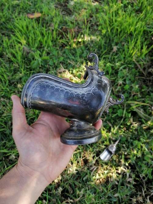 Vintage sugar scoop. Some denting