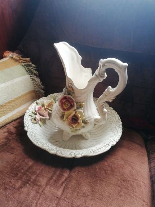 Antique porcelain, one flower have a chip