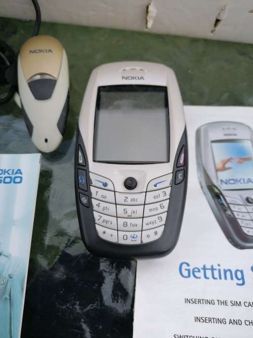 NOKIA 6600 NHL-10 GSM Symbian mobile phone, with charger, manual, ear piece and cd
