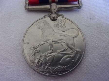 WW2 War Medal 19391945 with ribbon - D.J. Steyn