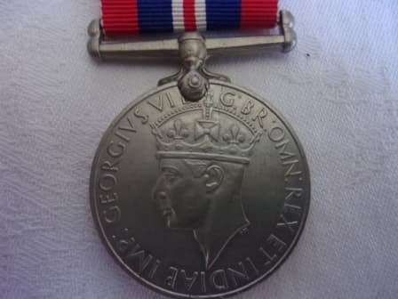 WW2 War Medal 19391945 with ribbon - D.J. Steyn