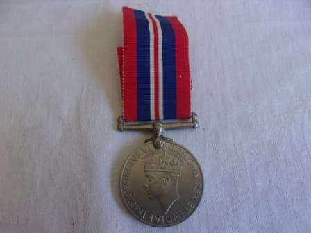 WW2 War Medal 19391945 with ribbon - D.J. Steyn