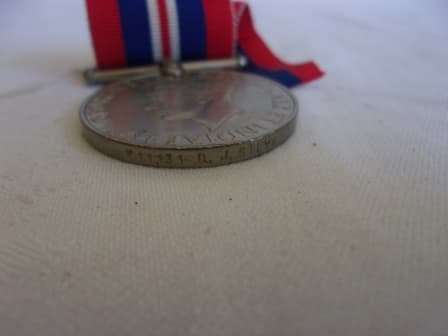 WW2 War Medal 19391945 with ribbon - D.J. Steyn