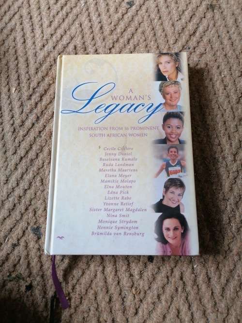 A WOMEN`S LEGACY SIGNED BY AUTHOR