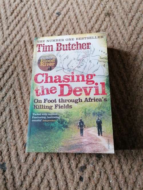 Chasing the devil signed by Tim butcher