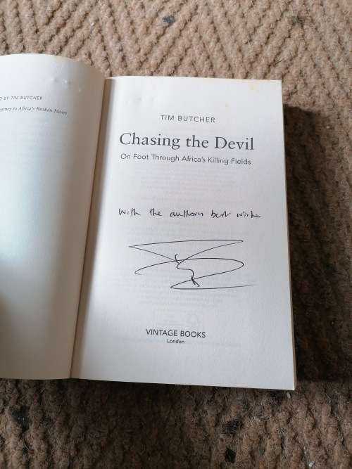 Chasing the devil signed by Tim butcher