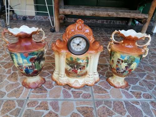 Wow stunning old porcelain Mantle set. Clock needs a service