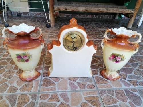 Wow stunning old porcelain Mantle set. Clock needs a service
