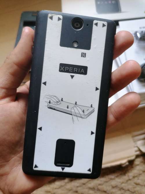 Sony Xperia v cell phone with charger, earphones, box and manuals. Working