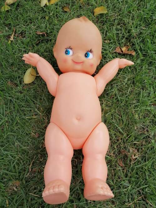 Large old kewpie doll. Needs repair to the neck area as per picture