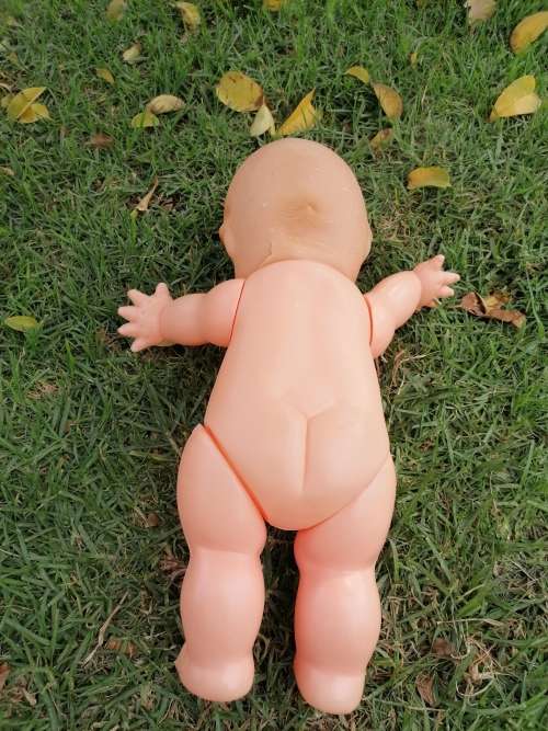 Large old kewpie doll. Needs repair to the neck area as per picture