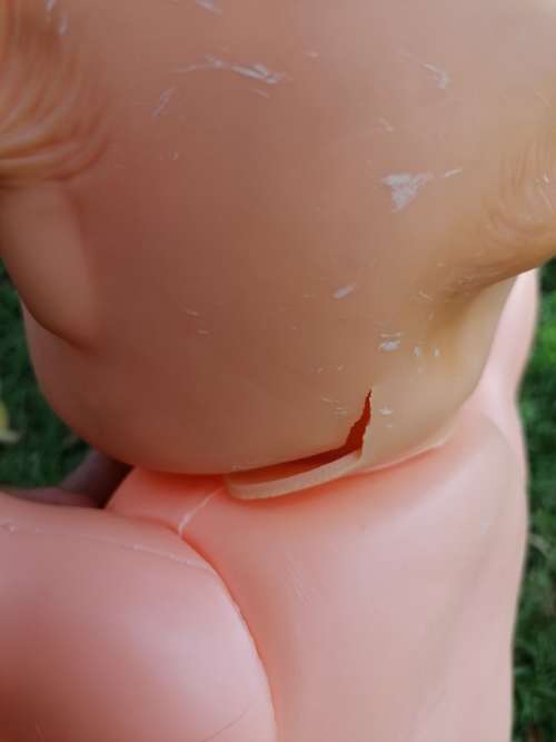Large old kewpie doll. Needs repair to the neck area as per picture
