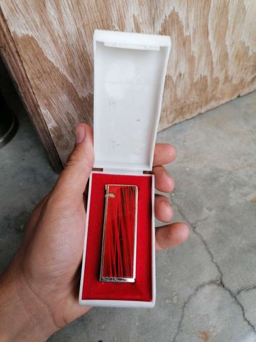 Vintage lighter in holder