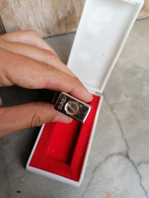 Vintage lighter in holder