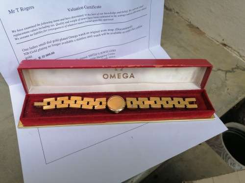 Working omega watch with original box. Valued at R35 000